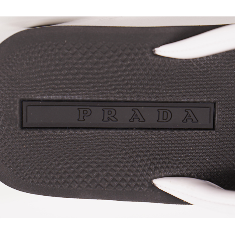 prada flip flops white